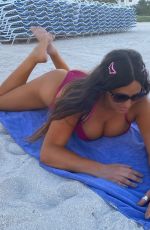 CLAUDIA ROMANI in a Red bikini in South Beach 10/20/2020
