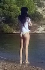 DAKOTA JOHNSON at a Beach on Spetses Island 10/21/2020