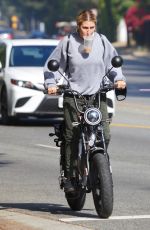 EMMA SLATER Driving Her Electric Bike Out in Studio City 10/19/2020