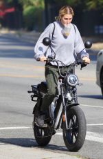 EMMA SLATER Driving Her Electric Bike Out in Studio City 10/19/2020
