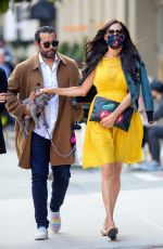 FAMKE JANSSEN in a Yellow Dress Out Friends New York 10/15/2020