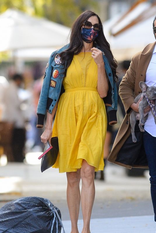 FAMKE JANSSEN in a Yellow Dress Out Friends New York 10/15/2020