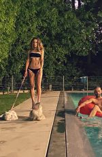 KATE BECKINSALE in Bikinis with her Dogs at a Pool - Instagram Photos 10/04/2020