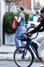 KATIE HOLMES and Emilio Vitolo Jr. Kissing Out Riding Bikes in New York 10/15/2020