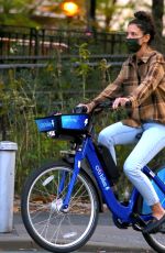 KATIE HOLMES and Emilio Vitolo Jr. Out Riding Citi Bikes in New York 10/20/2020