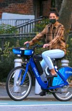 KATIE HOLMES and Emilio Vitolo Jr. Out Riding Citi Bikes in New York 10/20/2020