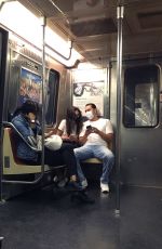 KATIE HOLMES and Emilio Vitolo Jr. Riding Downtown Subway Train in New York 10/01/2020