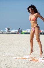 LAURA ANDERSON in Bikini Doing Yoga at a Beach in Dubai 10/08/2020