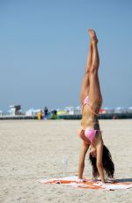 LAURA ANDERSON in Bikini Doing Yoga at a Beach in Dubai 10/08/2020