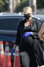 Pregnant ASHLEE SIMPSON at Gelson
