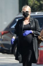 Pregnant ASHLEE SIMPSON at Gelson