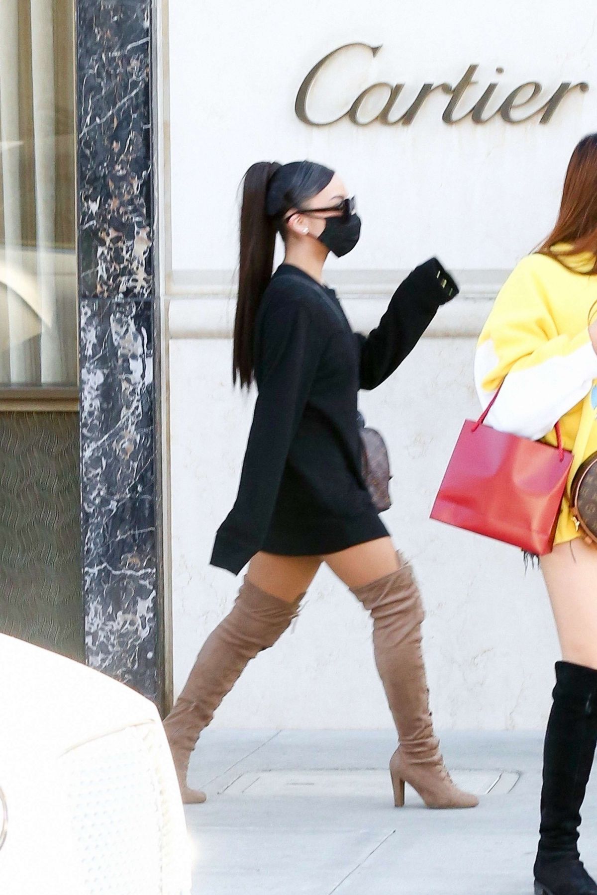 ARIANA GRANDE in a Short Dress and Overtheknee Boots Out Shopping in