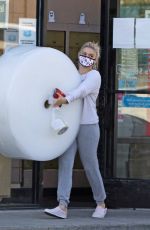 ARIEL WINTER Carrying a Large Roll of Bubble Wrap Out in Los Angeles 11/08/2020