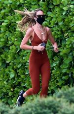 CANDICE SWANEPOEL in a Bodysuit Out Jogging in Miami 11/10/2020