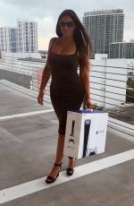 CLAUDIA ROMANI Out Shopping in Miami Beach 11/19/2020