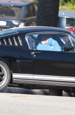 DAKOTA JOHNSON and Chris Martin Out Driving in Her Vintage Mustang in Malibu 11/27/2020