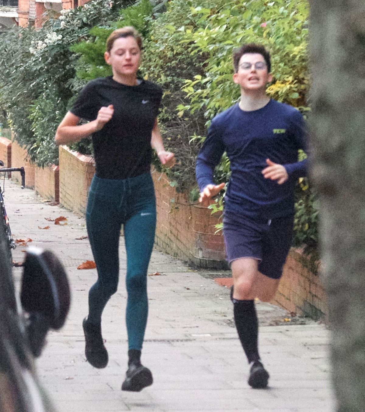 emma-corrin-out-jogging-with-a-friend-in-london-11-16-2020-3.jpg