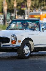 GWYNETH PALTROW Drives on Biden