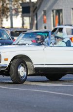 GWYNETH PALTROW Drives on Biden