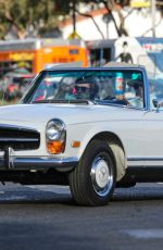 GWYNETH PALTROW Drives on Biden