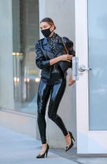 HAILEY BIEBER in YSL Latex Visits Maeve Reilly