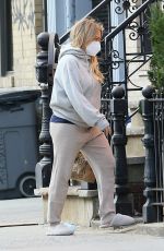 Pregnant HILARY DUFF Picking Up Delivered Food in New York 11/21/2020