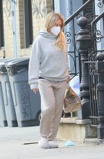 Pregnant HILARY DUFF Picking Up Delivered Food in New York 11/21/2020