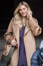 SIENNA MILLER on the Set of 