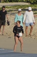 AMY SCHUMER in Swimsuit at a Beach in St. Barths 12/27/2020