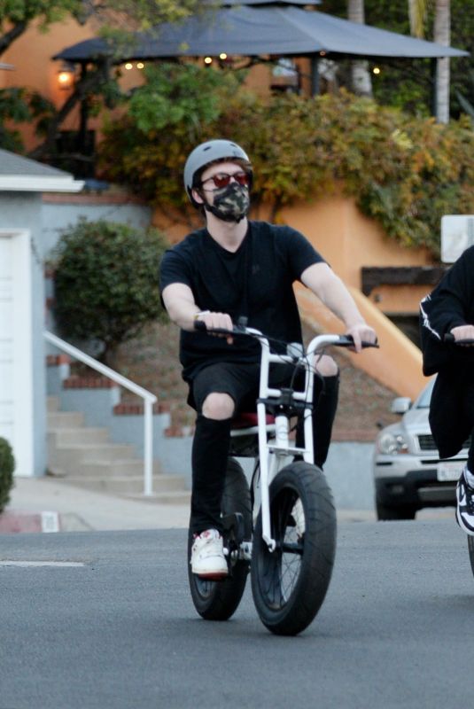 BILLIE EILISH and Finneas O’Connell Out Riding Bikes in Los Angeles 12/21/2020