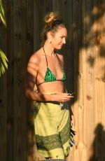 CANDICE SWANEPOEL in a Green Bikini Top Out in Miami 12/15/2020