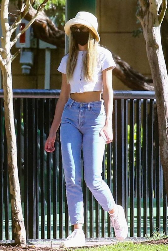 CANDICE SWANEPOEL in Denim Out at a Park in Miami 12/25/2020