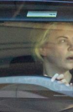 CHARLIZE THERON Leaves Gym in her Porsche in Beverly Hills 12/20/2020