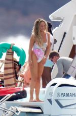 CHRISSY TEIGEN in Swimsuit at a Boat in St.Barth 12/29/2020