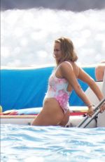 CHRISSY TEIGEN in Swimsuit at a Boat in St.Barth 12/29/2020