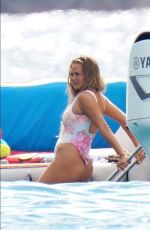 CHRISSY TEIGEN in Swimsuit at a Boat in St.Barth 12/29/2020