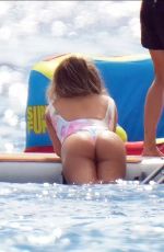 CHRISSY TEIGEN in Swimsuit at a Boat in St.Barth 12/29/2020