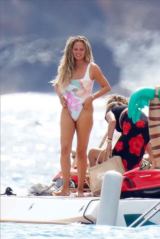 CHRISSY TEIGEN in Swimsuit at a Boat in St.Barth 12/29/2020