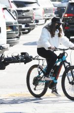 CHRISTINA and Arnold SCHWARZENEGGER Out Riding Bikes in Brentwood 12/18/2020