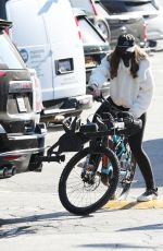 CHRISTINA and Arnold SCHWARZENEGGER Out Riding Bikes in Brentwood 12/18/2020