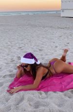 CLAUDIA ROMANI in Bikini and a Santa Hat on the Beach in Miami 12/01/2020