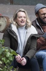 ELISABETH MOSS on the Set of The Handmaid