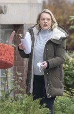 ELISABETH MOSS on the Set of The Handmaid