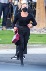 FLORENCE PUGH on the Set of Don