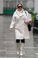 KELLY BROOK in a White Coat and Boots at Global Radio in London 12/23/2020
