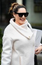 KELLY BROOK in a White Coat and Boots at Global Radio in London 12/23/2020