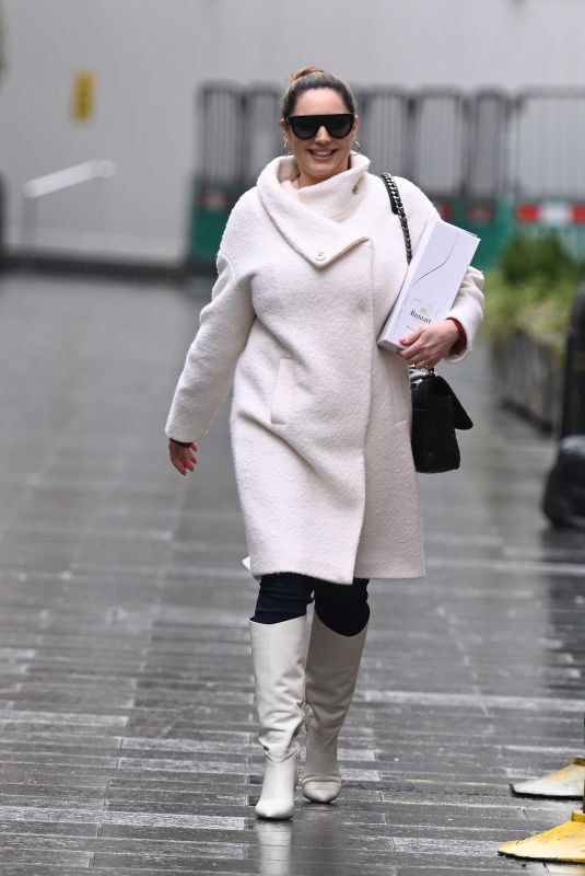 KELLY BROOK in a White Coat and Boots at Global Radio in London 12/23/2020