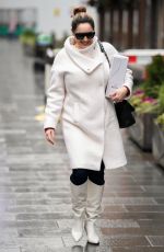 KELLY BROOK in a White Coat and Boots at Global Radio in London 12/23/2020