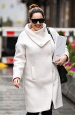 KELLY BROOK in a White Coat and Boots at Global Radio in London 12/23/2020