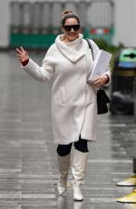 KELLY BROOK in a White Coat and Boots at Global Radio in London 12/23/2020